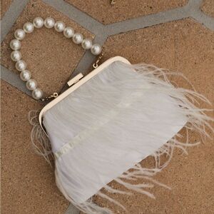 White feather purse